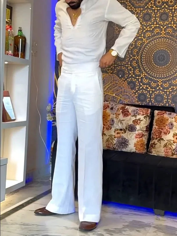 White polyester three-piece outfit with V-neck shirt, sleeveless vest, and regular-fit trousers.