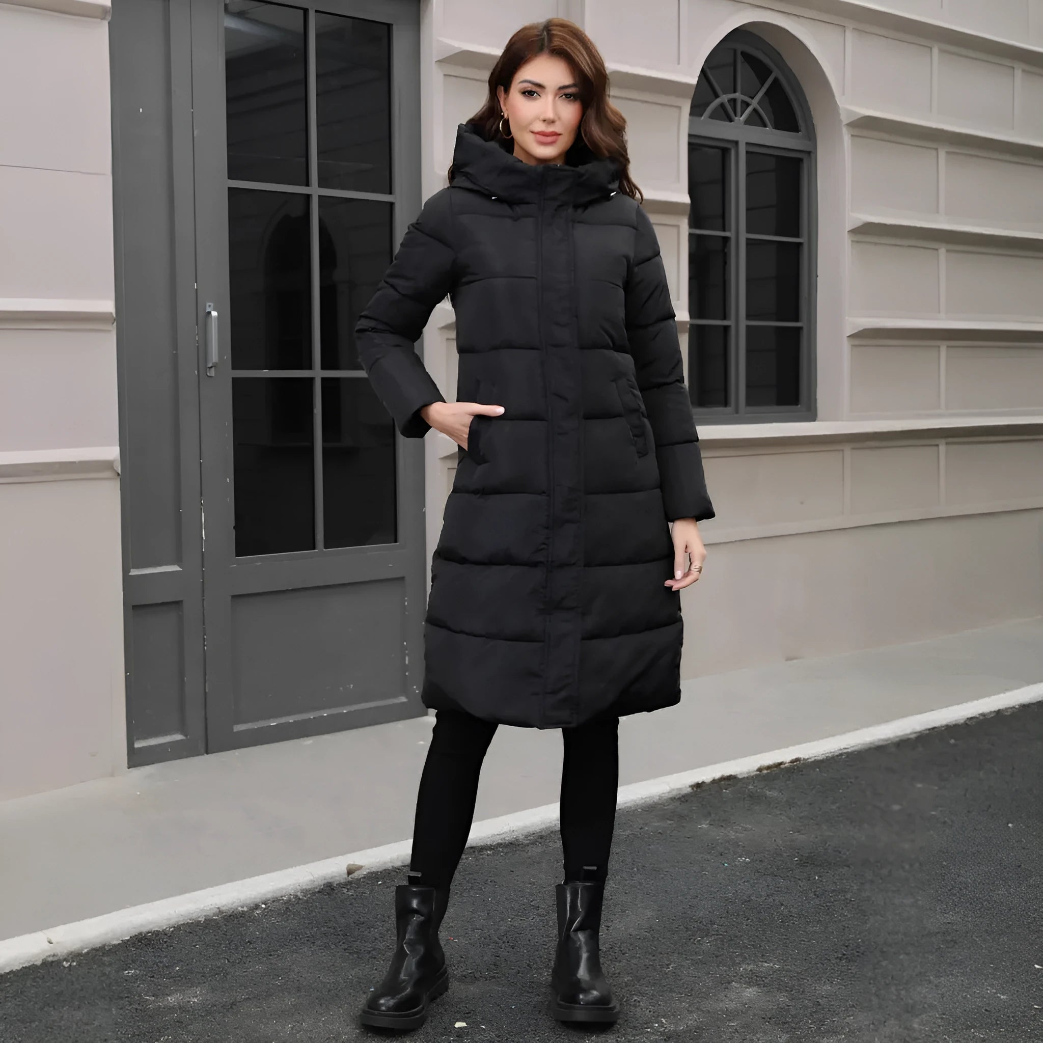 Black hooded slim fit winter jacket with long sleeves on man