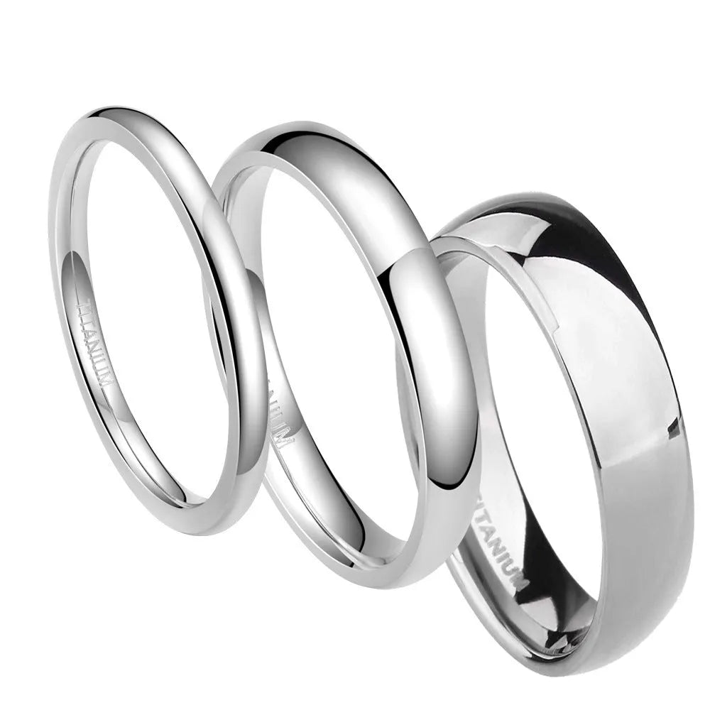 Silver titanium steel ring with grinding finish on finger, showing smooth surface and uniform colour