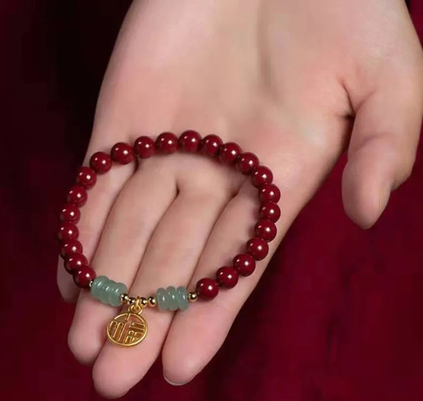 Gold cinnabar wave bracelet with solid copper beads in handcrafted national style design