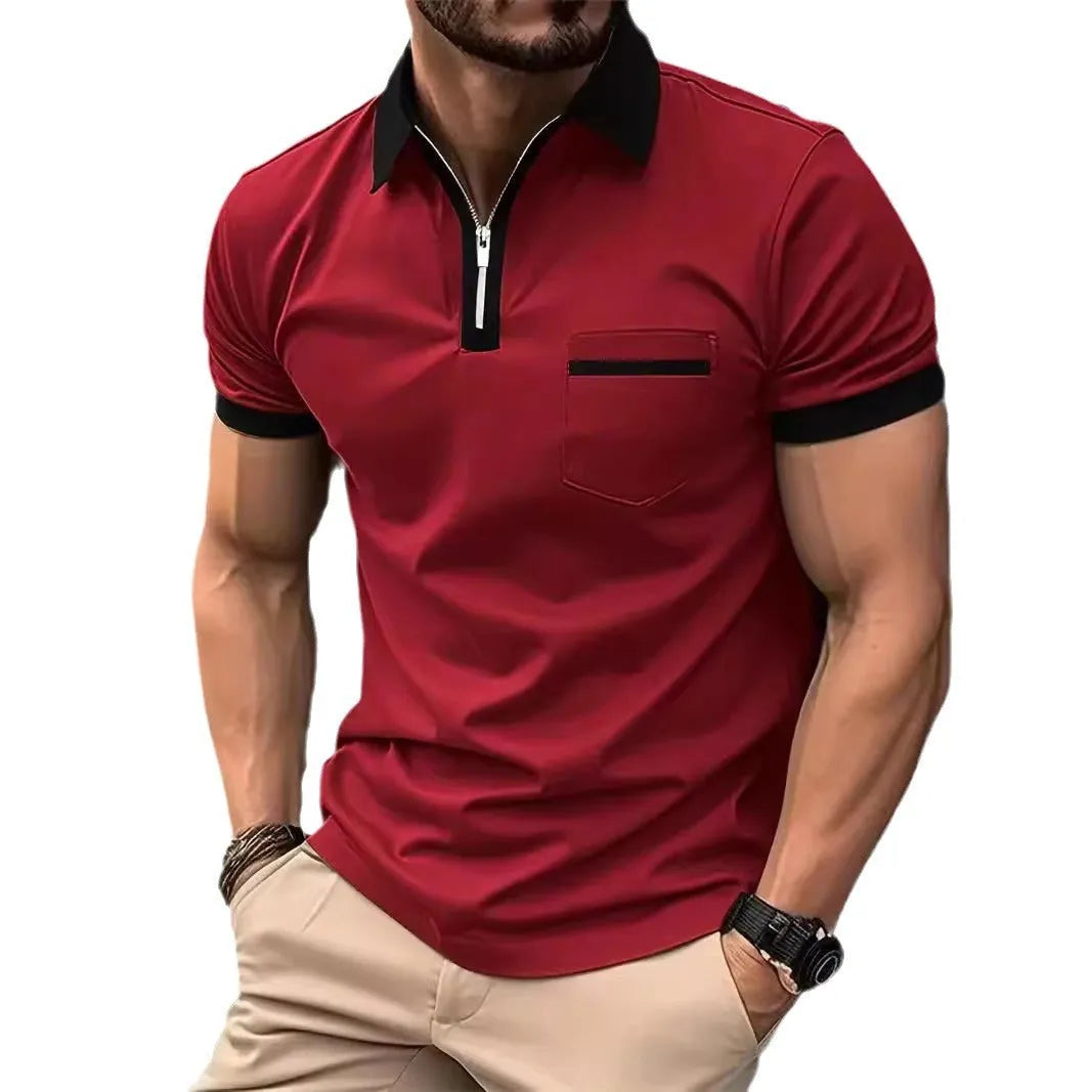 Man wearing a loose-fit short-sleeve casual shirt with a chest pocket and zipper decorations on the front.