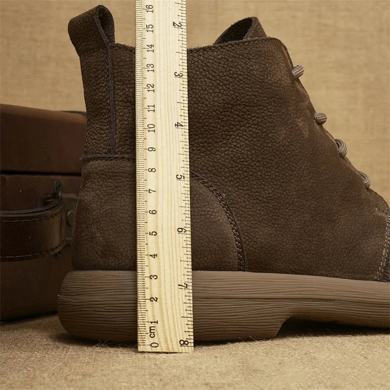 Men's grey frosted leather Martin boots with wedge heel and lace-up front.