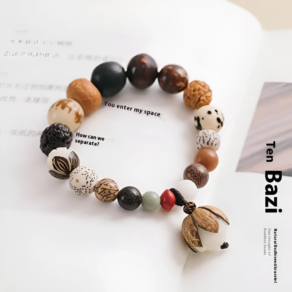 Geometric Bodhi seed bead bracelet with 18 beads on a wrist, showing a 16cm unisex fit.