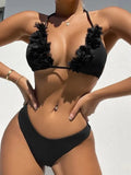 Black women's two-piece bikini set with a gathered swim top and matching shorts.