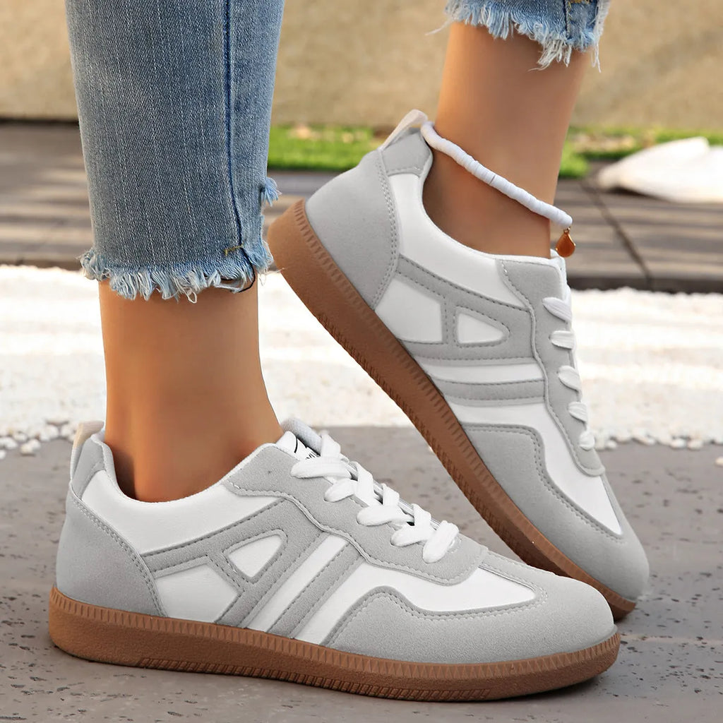 Women's retro colour matching lace-up casual trainers with a low platform heel in black, grey, or khaki.