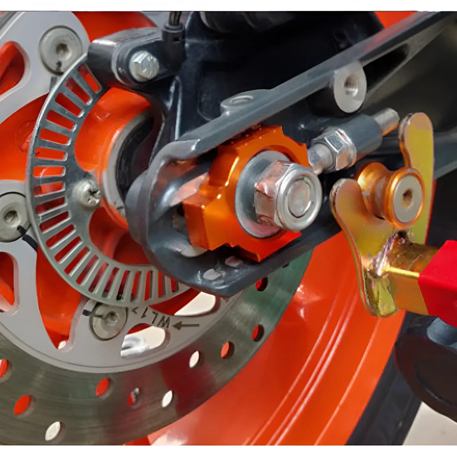Pair of orange metal screw regulators for KTM DUKE motorcycle rear fork modification
