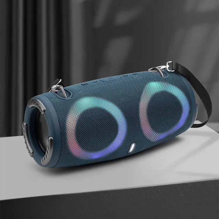 War Drum Bluetooth speaker with RGB lights in black colour, showing strap and button controls for portable outdoor audio