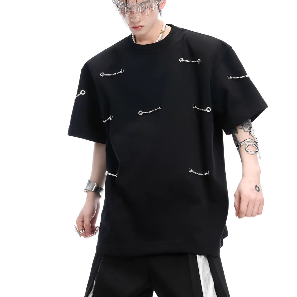 Black men's T-shirt with metal chain detail on padded shoulders, short sleeves, and round neck.