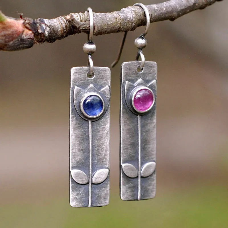 Antique finish geometric earrings with 8mm oval red sapphire centre stone on sterling silver