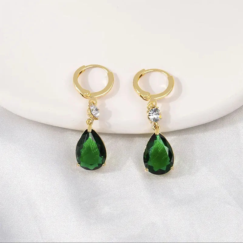 Geometric teardrop earrings in green colour with alloy construction, measuring 3 cm in length