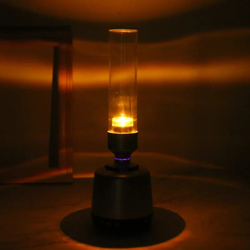 White silver Bluetooth speaker with candlelight-style lighting, 90x277mm dimensions