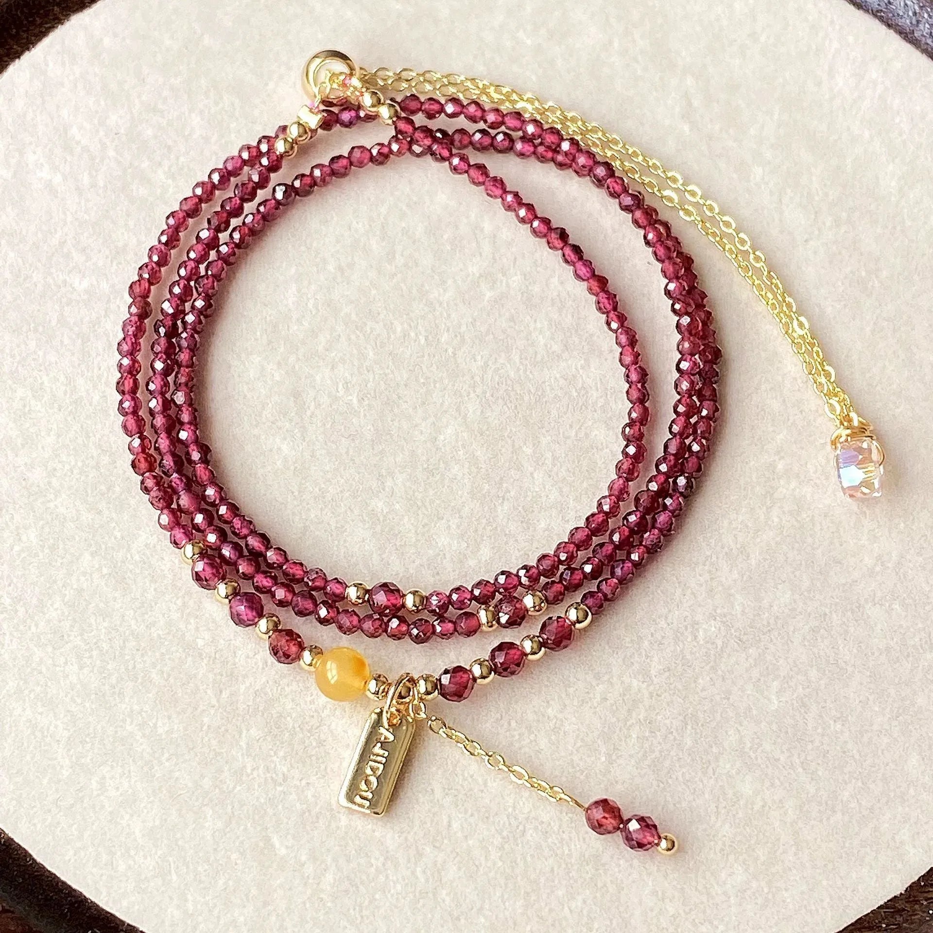 Wine red garnet bracelet with beeswax cut beads that can also be worn as a necklace.