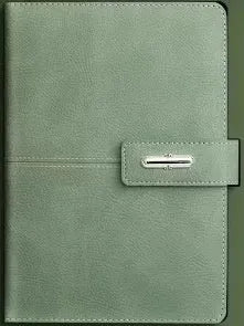 A5 notebook with imitation leather cover in various colours, open to show wood-free paper pages