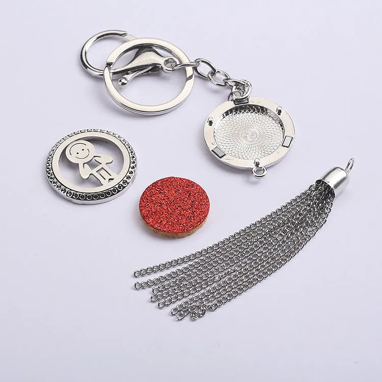 Alloy aromatherapy car pendant diffuser with tassel design and cotton pads for vehicle scenting