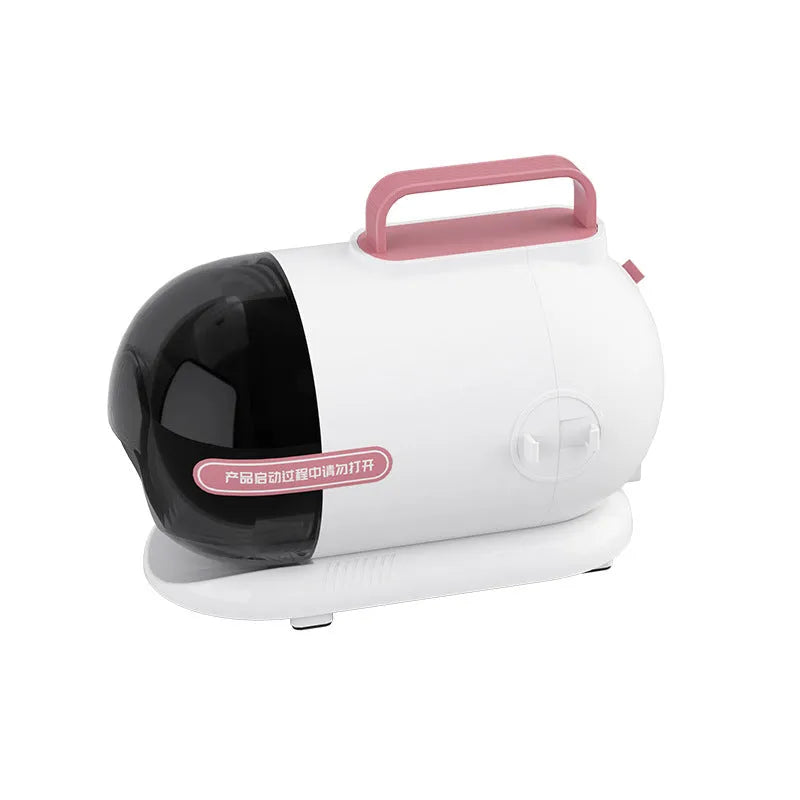Pink and white multifunctional pet grooming vacuum cleaner with hose, clipper, and attachments on a white background.