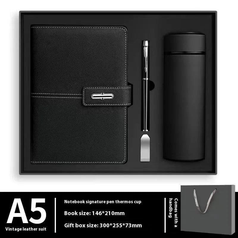 A5 notebook with imitation leather cover in various colours, open to show wood-free paper pages