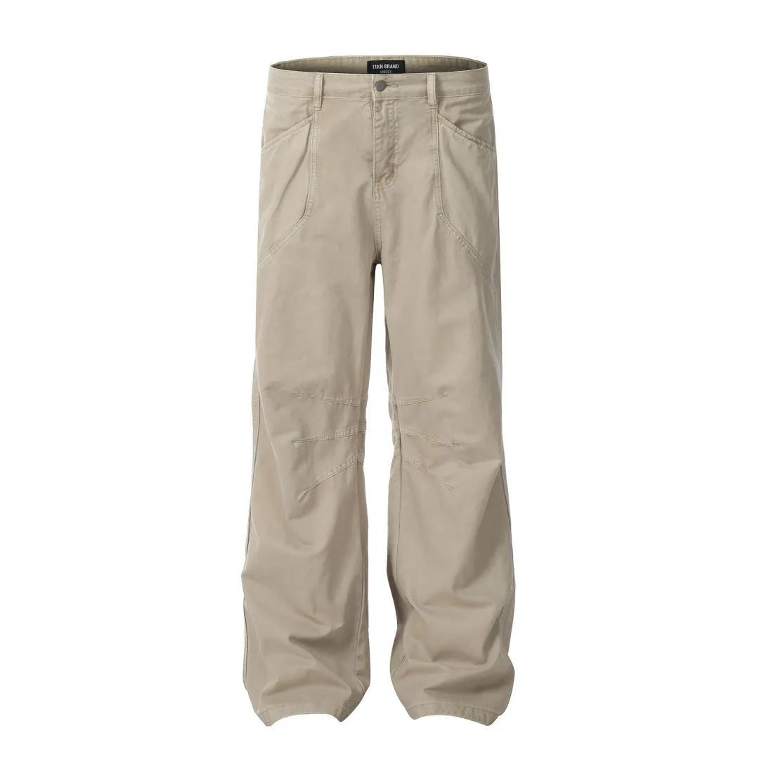 Men's brown straight-leg trousers with high waist and non-ironing cotton fabric on a hanger