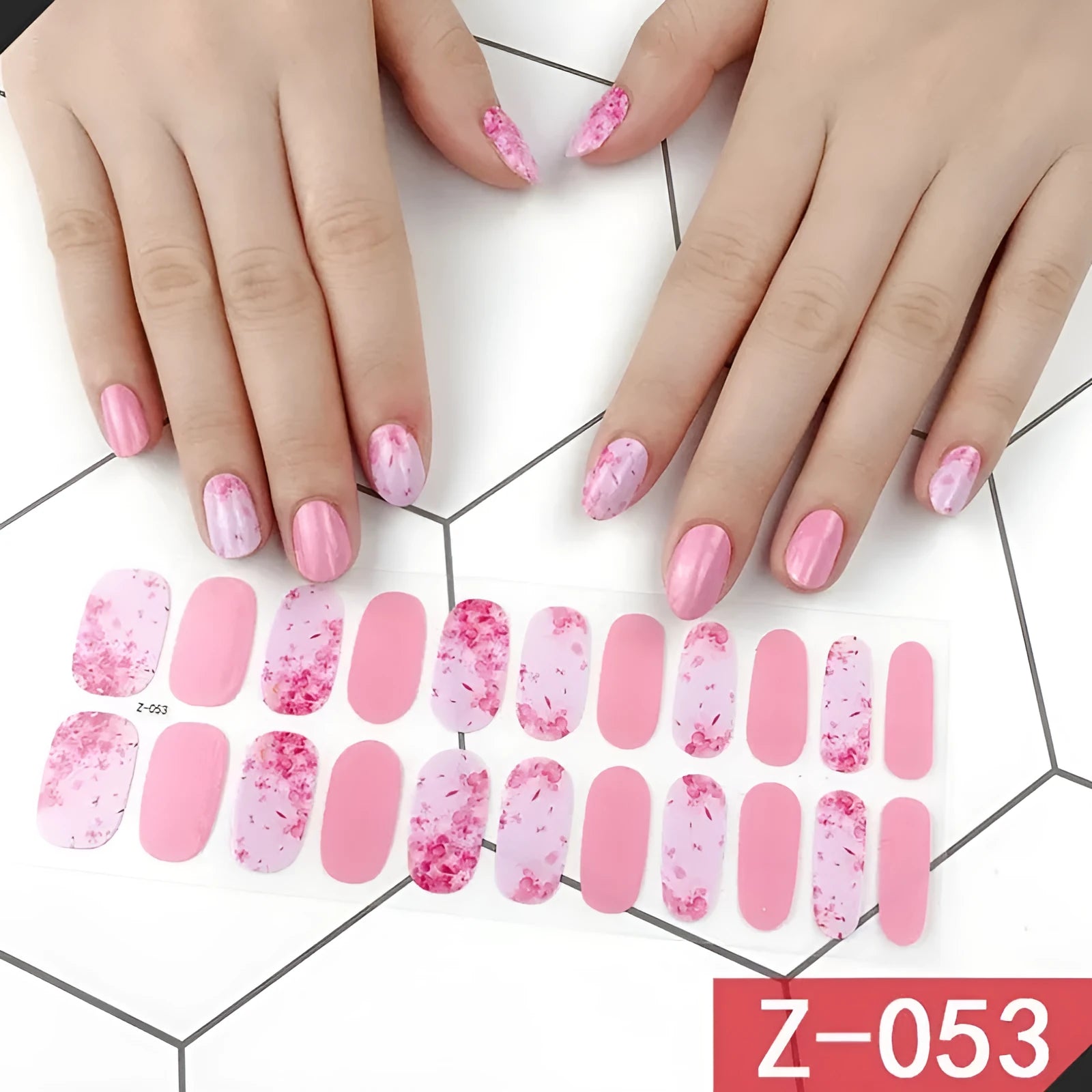 Pack of Korean nail stickers showing cartoon, strawberry, floral, and bow patterns with a nail file.