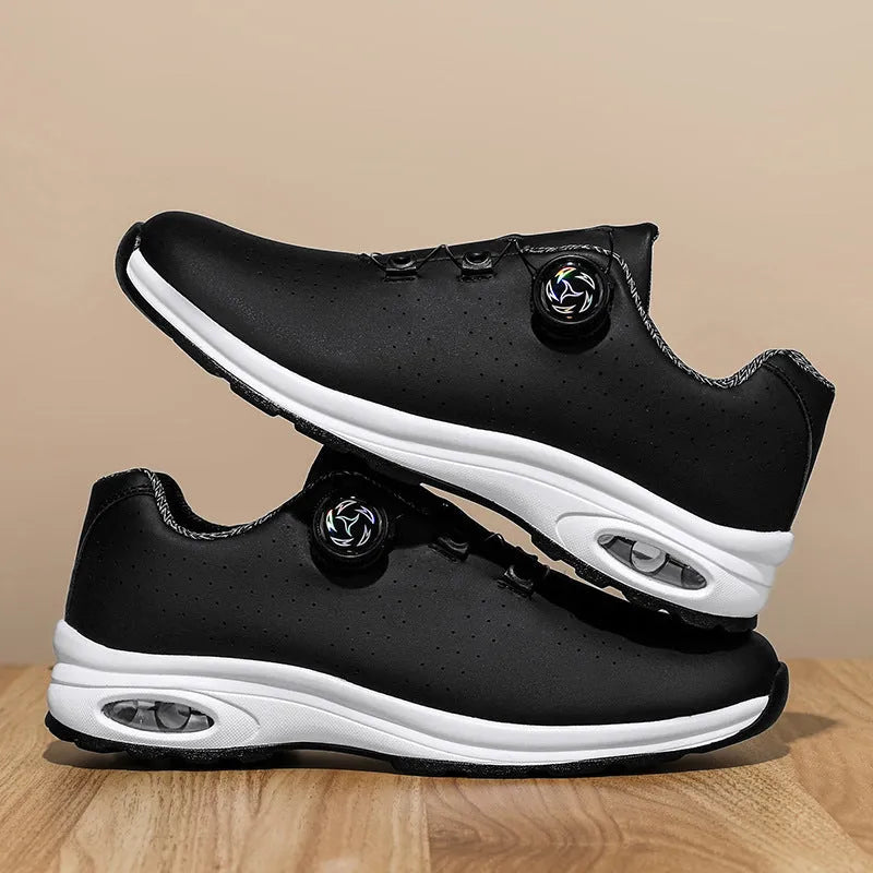 Low-top casual shoes in black with mesh upper, composite sole, and lace-up front closure on a neutral background
