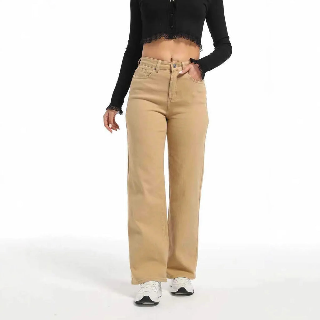Women's high-waist straight jeans with wide leg design in apricot colour, showing 100% cotton fabric with high elasticity