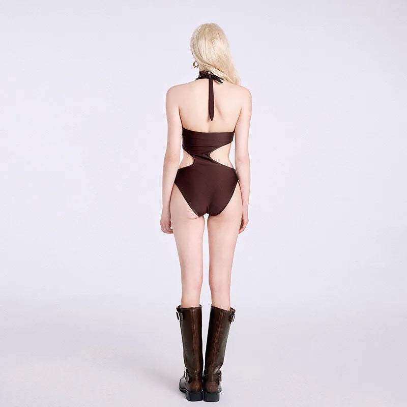 Dark brown one-piece swimsuit for girls on a hanger, showing sleeveless bikini style.
