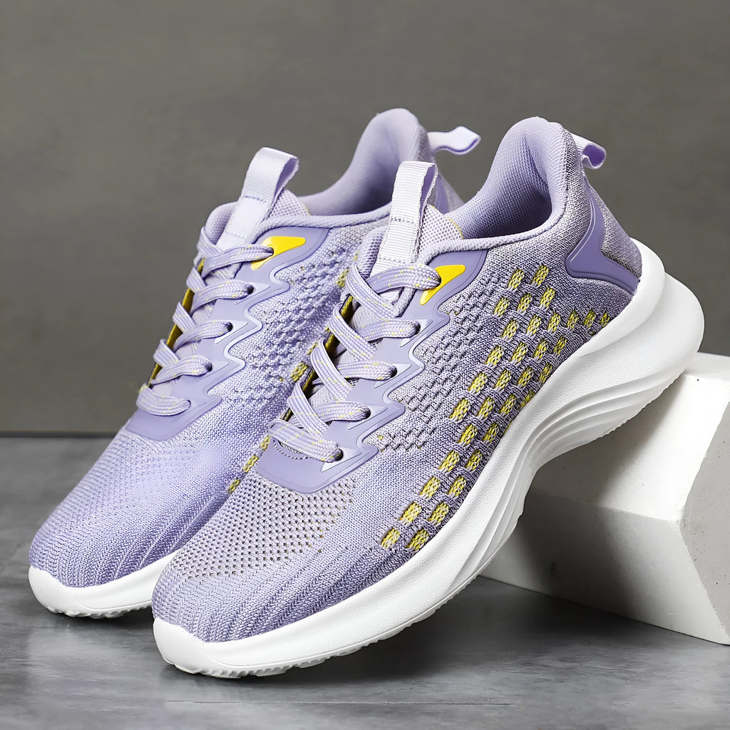 Women's lavender purple Flyknit running shoes with stripe pattern and mesh lining.