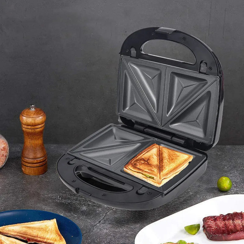 Black electric sandwich pan with double-sided heating, brushed stainless steel cover, and 29-31cm non-stick cooking surface