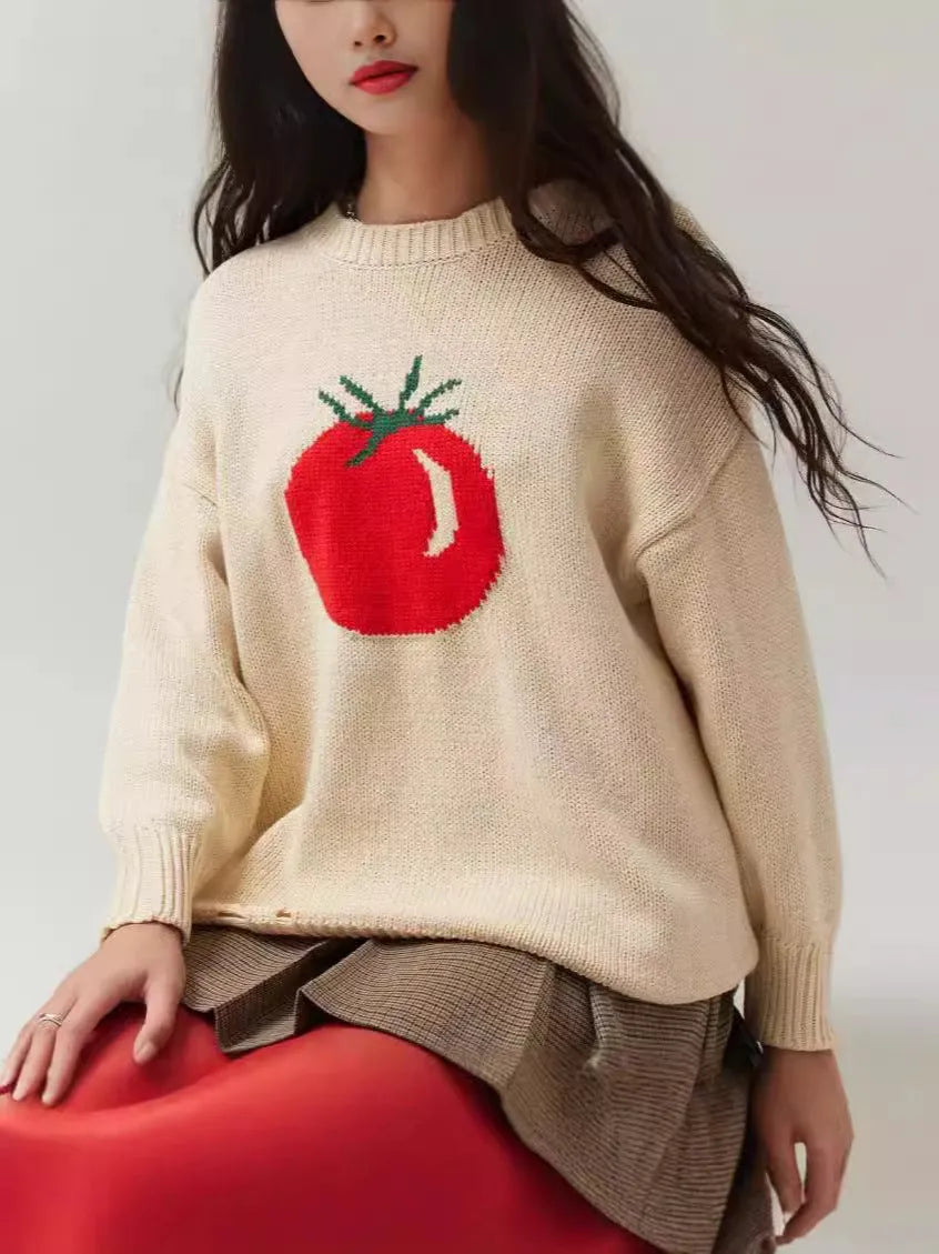 Women's acrylic jacquard pullover sweater in milky white with round neck and long sleeves, showing loose fit and textured pattern