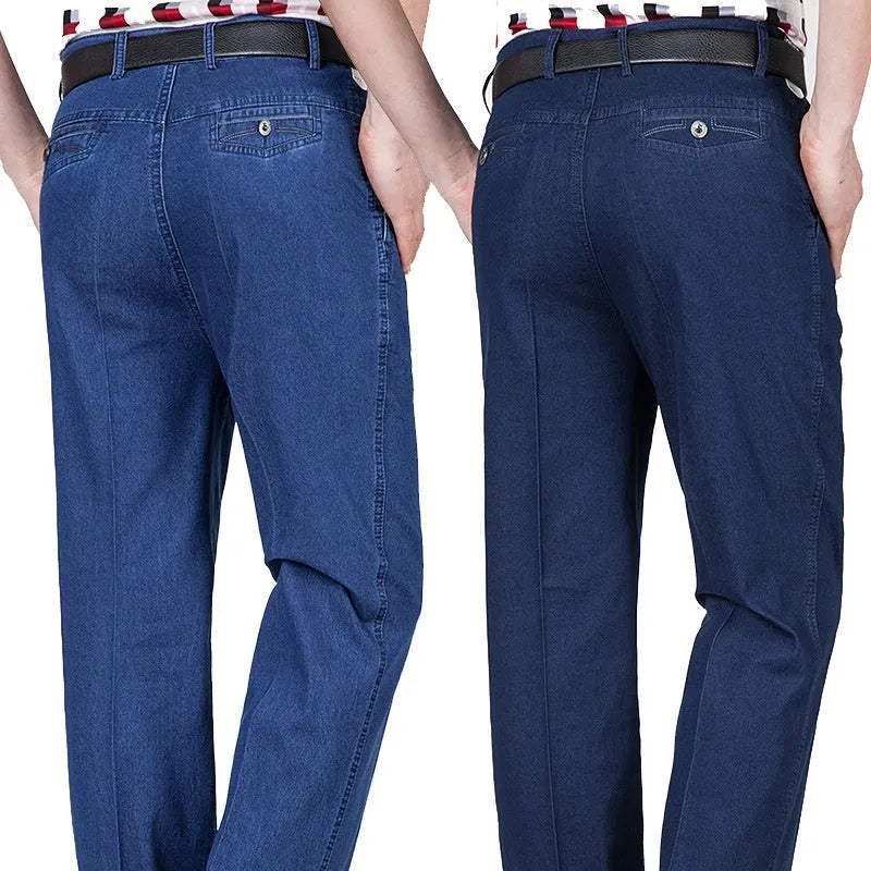 Men's high-waist loose blue denim trousers on a neutral background