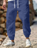 Men's straight-leg cotton trousers with elastic waistband in various colours including Army Green and apricot