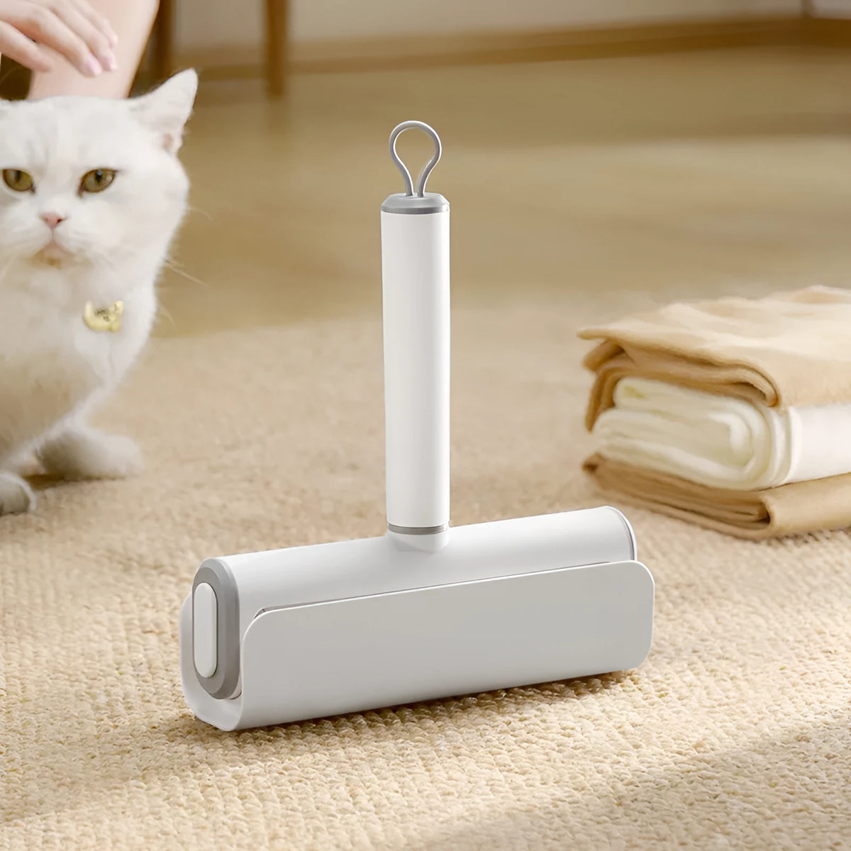 Lint removal roller tool for pet hair with tearable paper sticks on handle