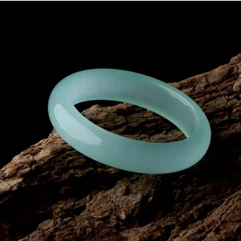 Quartz rock jade bracelet in modern simplicity style showing oil cyan light green colour