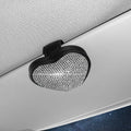Magnetic car sun visor clip with diamond accents holding sunglasses, measuring 8.0 by 7.3 cm