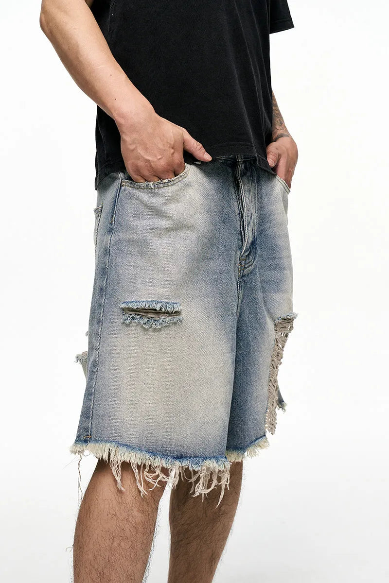 Light blue retro washed men's baggy denim shorts with mid-waist and wide-leg fit
