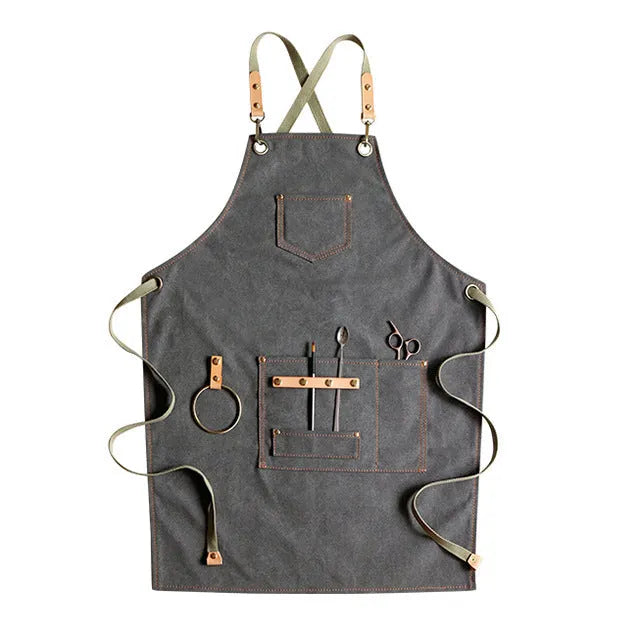 Canvas apron with cross-back straps in camel colour, shown on a person for milk tea shop or cafe use