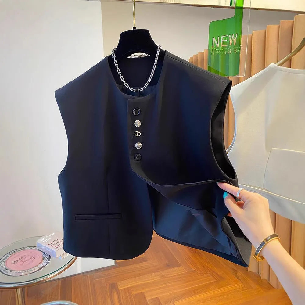 Beige loose-fitting waistcoat dress with side pockets, 40cm length, shown on mannequin