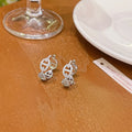 Women's copper electroplated diamond earrings with thick gold plating in silver, gold, and rose gold colour options