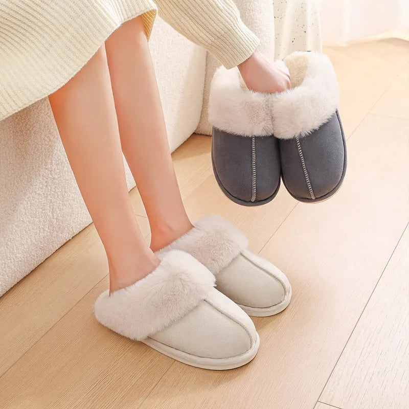 Women's brown plush indoor slippers with round toe, flat heel, and anti-slip PVC sole.