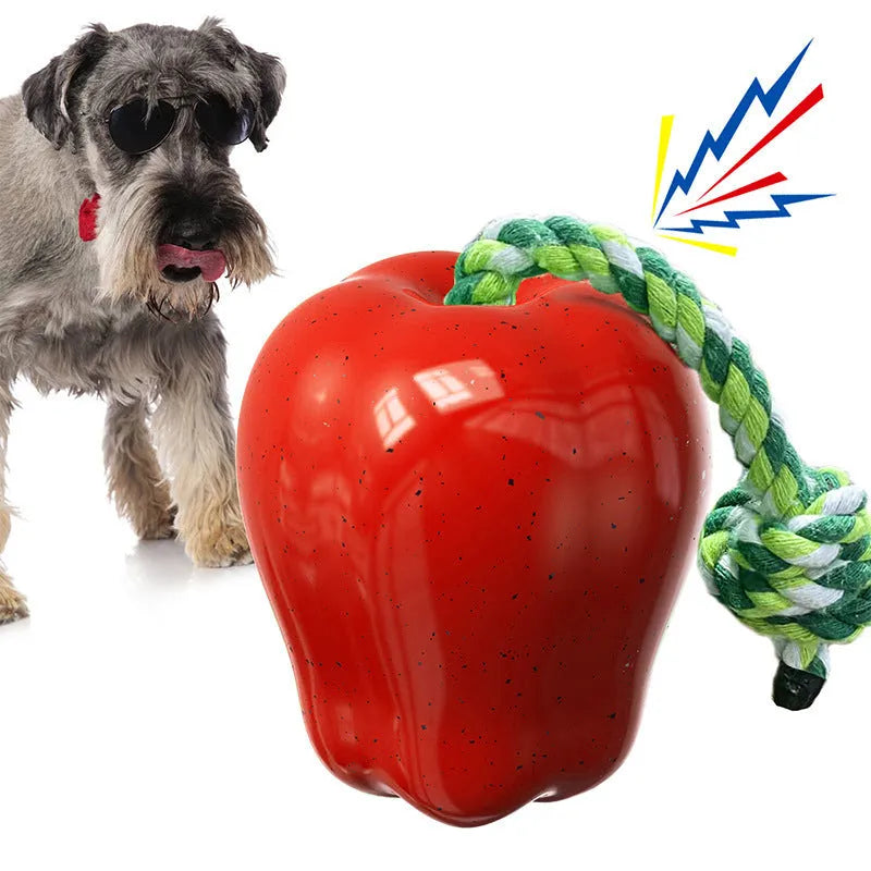 Green plastic spherical dog toy with textured surface and food dispensing opening for dental care and interactive play
