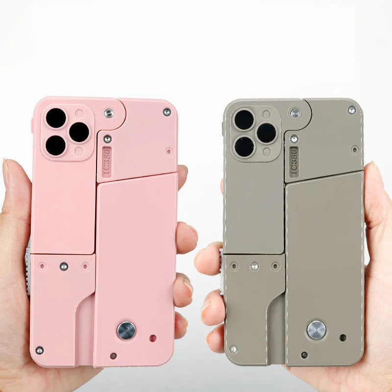 Folding mobile phone toy dart blaster in pink showing double barrels and safe EVA foam bullets
