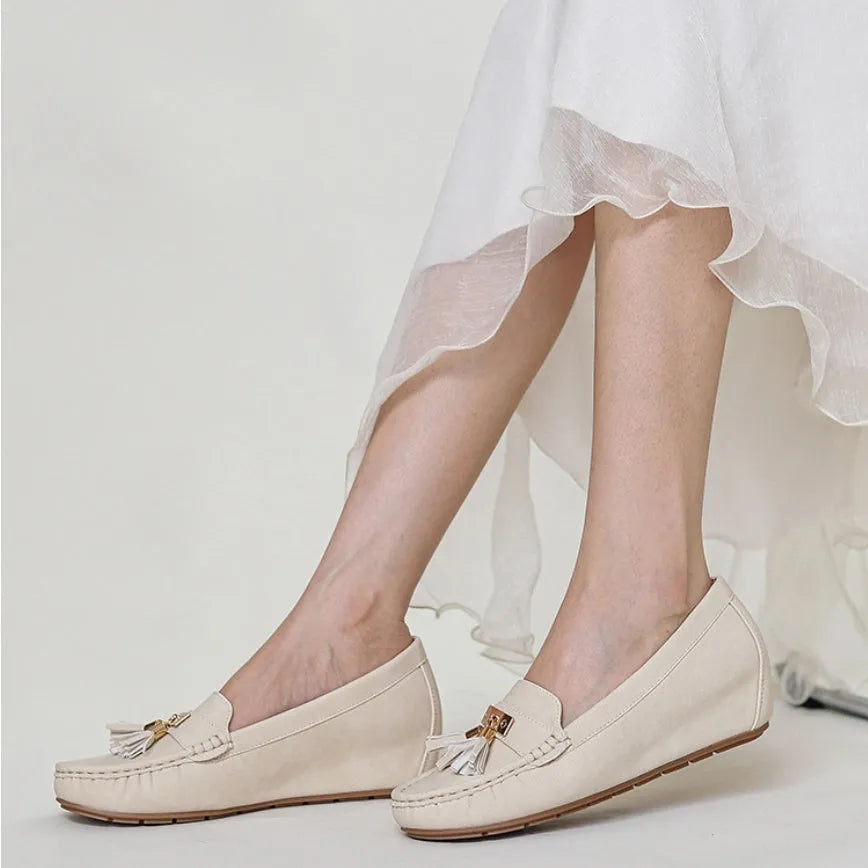 Beige women's oversleeve casual shoes with a round toe and mid heel for height increase.
