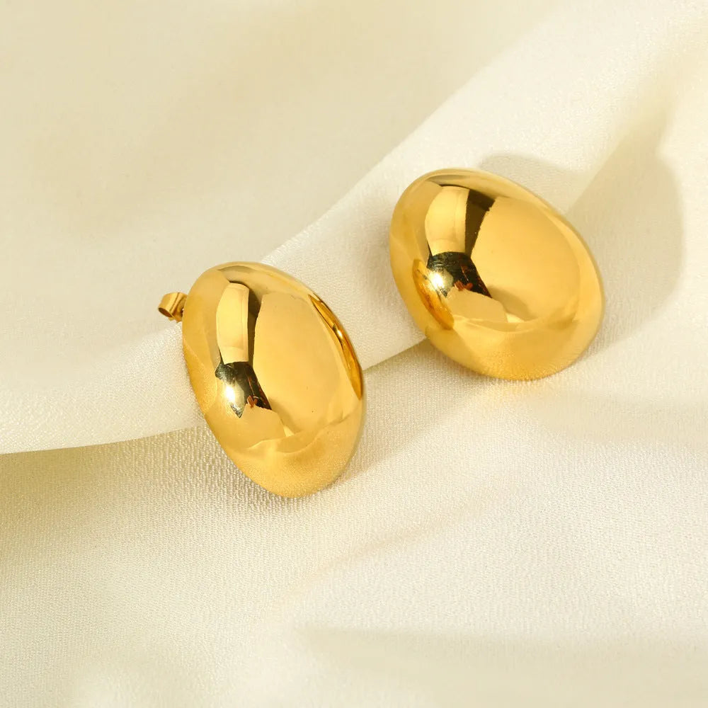 Geometric stainless steel ear studs with 18K gold electroplating in DFE139 colour, showing exaggerated glazed surface