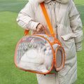Transparent hard EVA cat backpack in grass green, showing 42x28x35cm dimensions and foldable design for storage