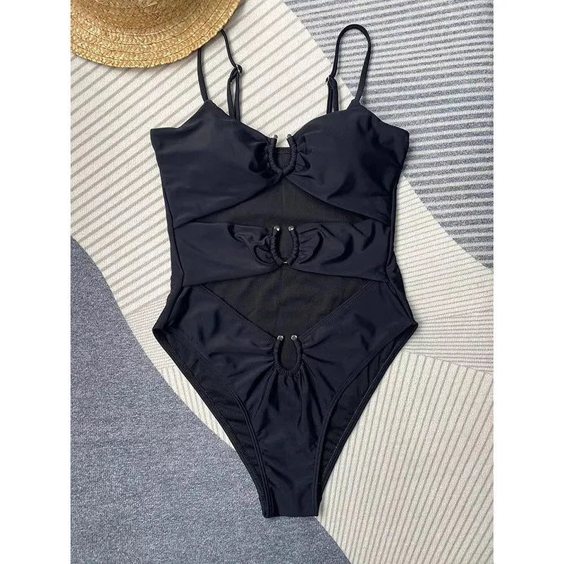 Black solid colour women's one-piece swimsuit with a tight fit