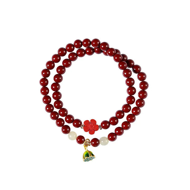 Hand-woven purple gold sand double circle bracelet with a 6mm lotus seedpod bead.
