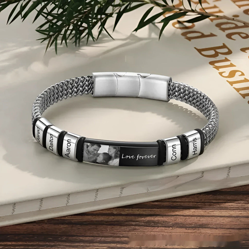 Adjustable leather rope bracelet with titanium steel lettering beads and a heart-shaped charm.