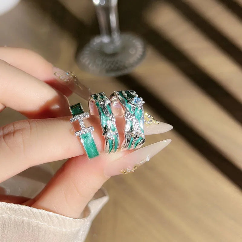 Mint green enamel eight-point asterism ring with irregular folding copper design