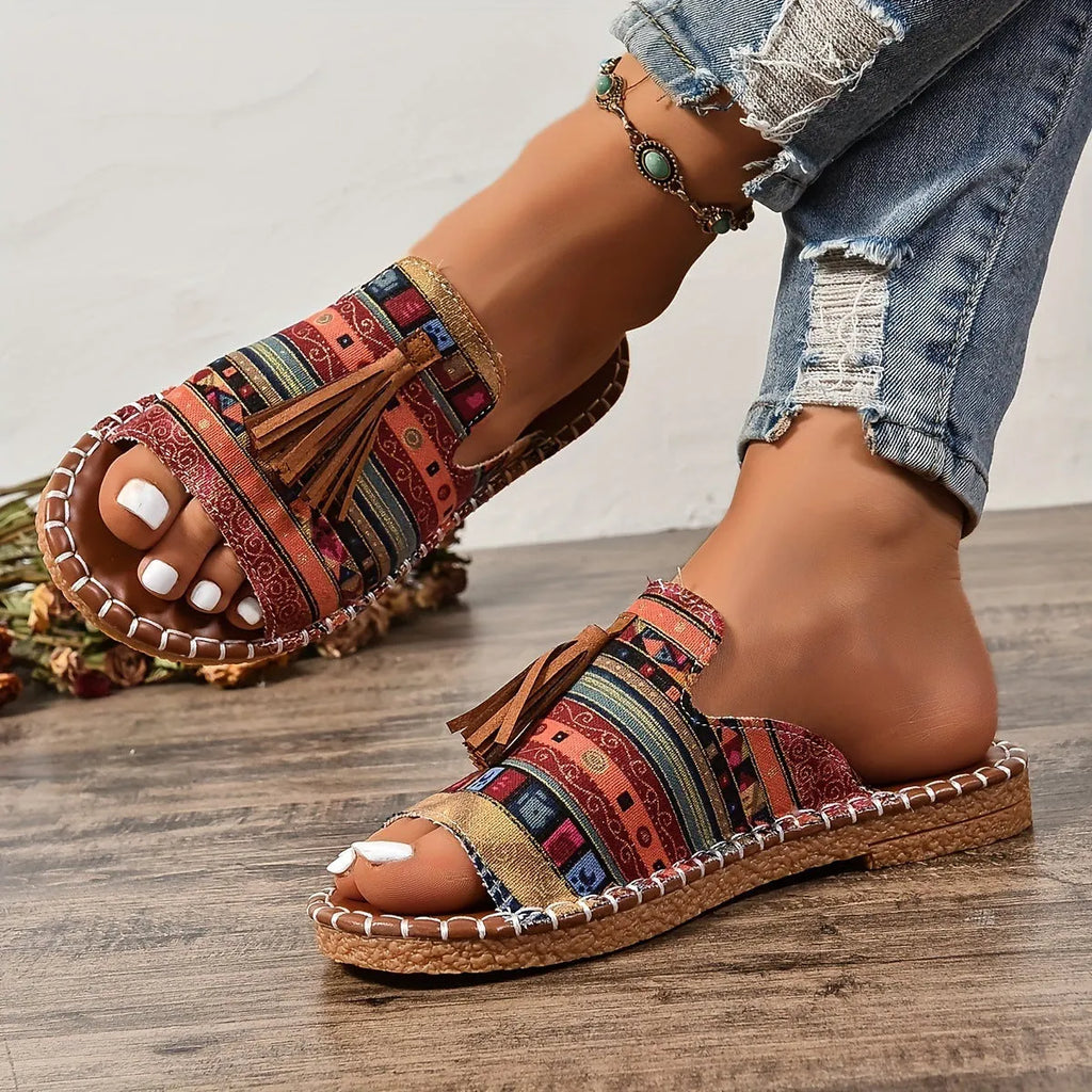Women's tassel flat sandals in first layer cowhide with fish mouth toe, Roman style, shown in wine red
