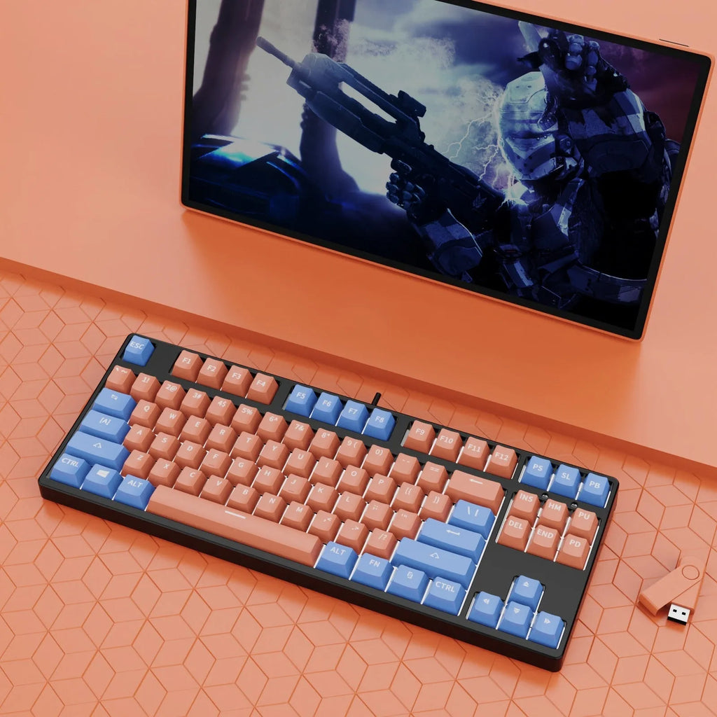 87-key wired mechanical keyboard with two-tone keycaps and metal frame, showing compact design and included tools