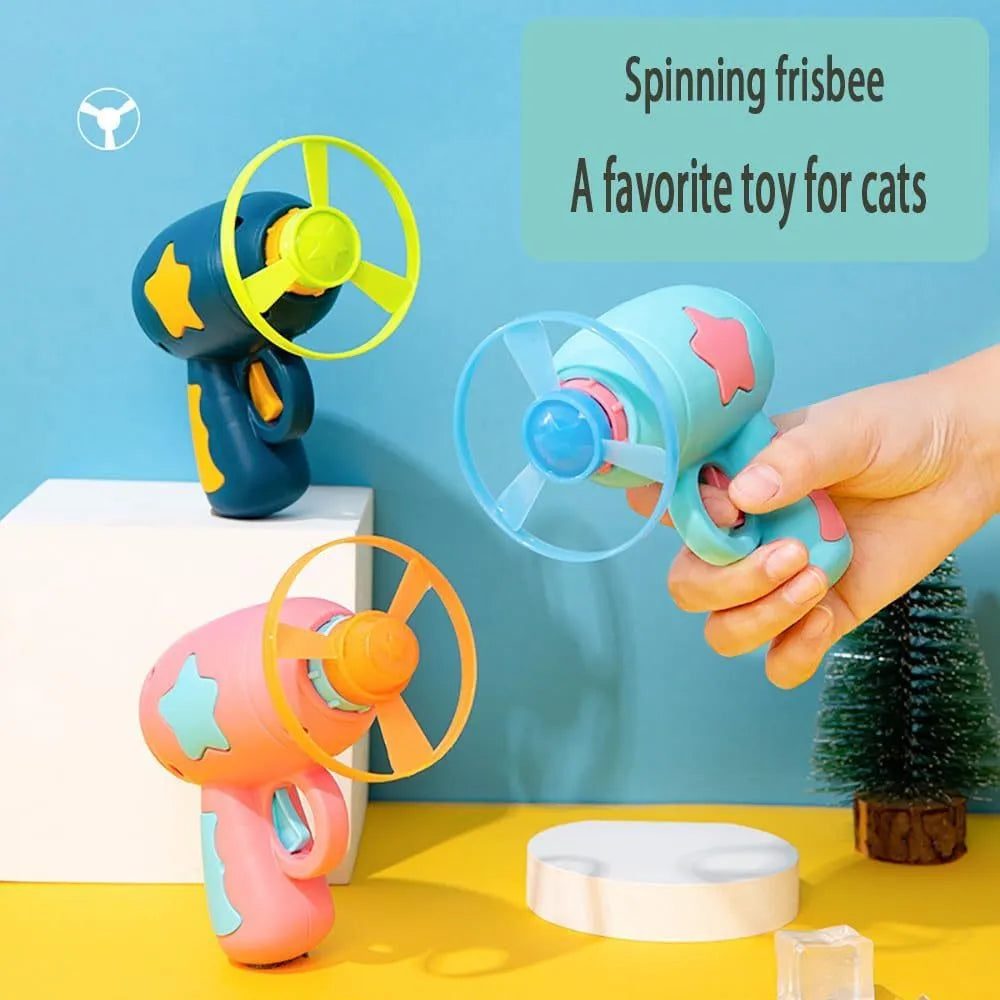 Blue and pink plastic cat toy gun with frisbee measuring 11cm long 10.5cm wide 7.5cm high